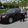 Jenson Button con un Rolls-Royce en el último Gran Premio de F1