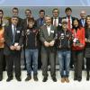 Marc Márquez y Dani Pedrosa con trabajadores de Repsol